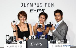 Olympus將集中資源開發無反光鏡相機(source: www.news.cn) BigPic:900x574