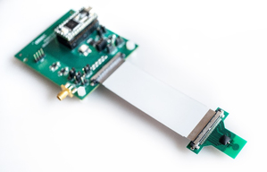 由imec開發的全新脈衝無線電超寬頻發射器晶片具備高達1.66Gb/s的資料傳輸率,可用來支援體內感測與短程測距應用。